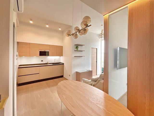 Da Bilocale ad Elegante Open Space : Ristrutturazione Completa con Cucina Abitabile e Cabina Armadio